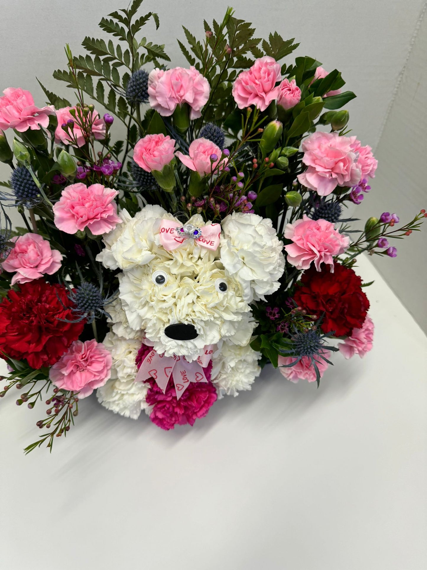 flower dog floral arrangement