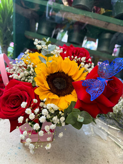 Square Floral Arrangement Of Fresh Roses And Sunflower