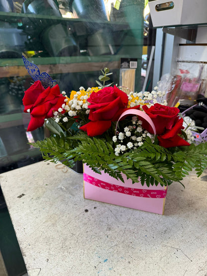 Square Floral Arrangement Of Fresh Roses And Sunflower