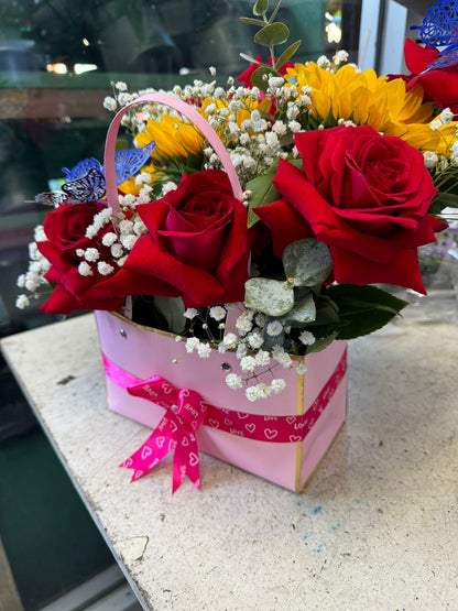 Square Floral Arrangement Of Fresh Roses And Sunflower