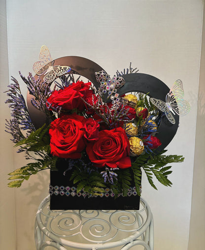 Chocolates And Fresh Roses Floral Arrangement